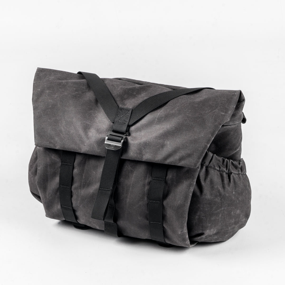 Wotancraft Pilot 10L messenger camera bag in charcoal black waxed canvas, front view