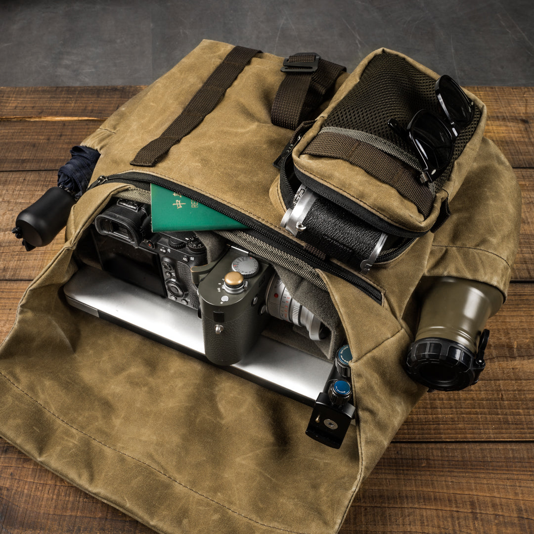 Wotancraft Pilot 10L khaki bag packed with camera, laptop, passport and pouch