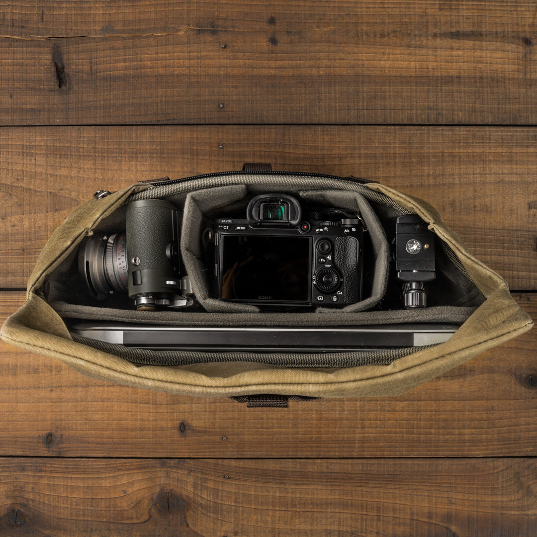 Wotancraft Pilot 10L khaki bag from above with Sony camera, lenses and laptop