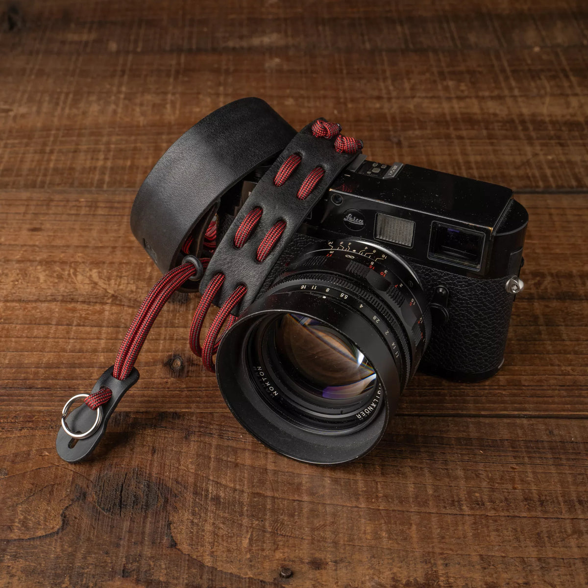 Wotancraft Parashooter Style 11 strap on a black Leica with Nokton lens