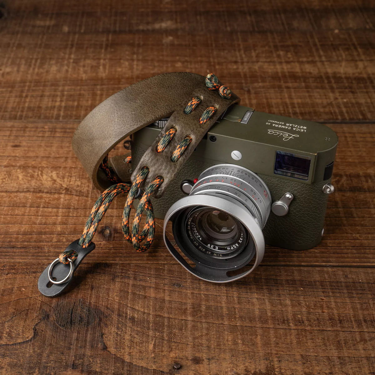 Wotancraft Parashooter Style 8 strap on an olive Leica M with silver lens