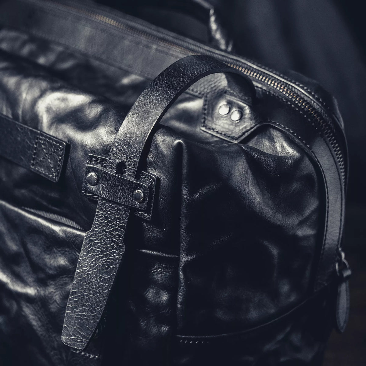 Wotancraft Lightning Rider black leather strap and rivets close-up