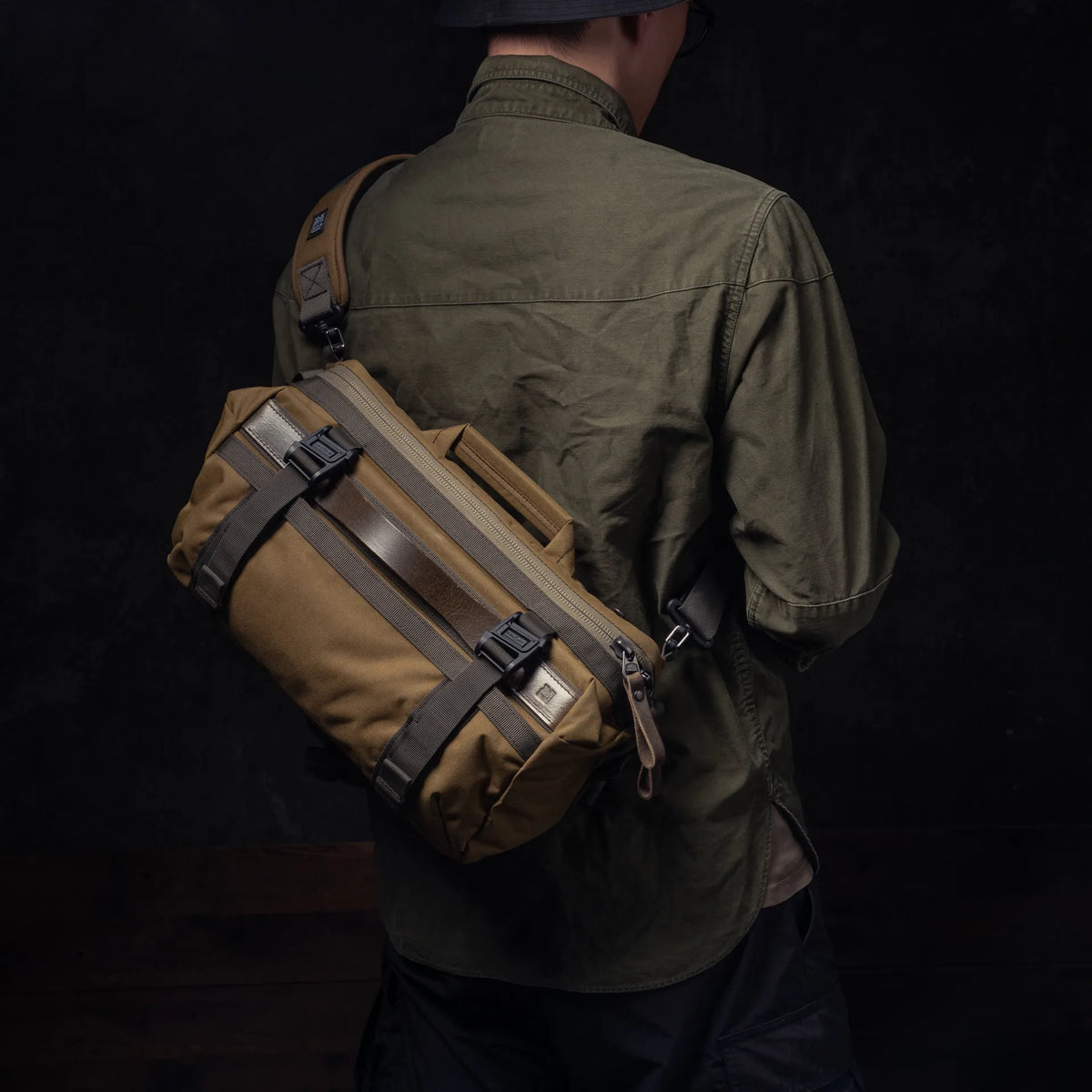 Man wearing the Wotancraft Easy Rider khaki sling bag on the back