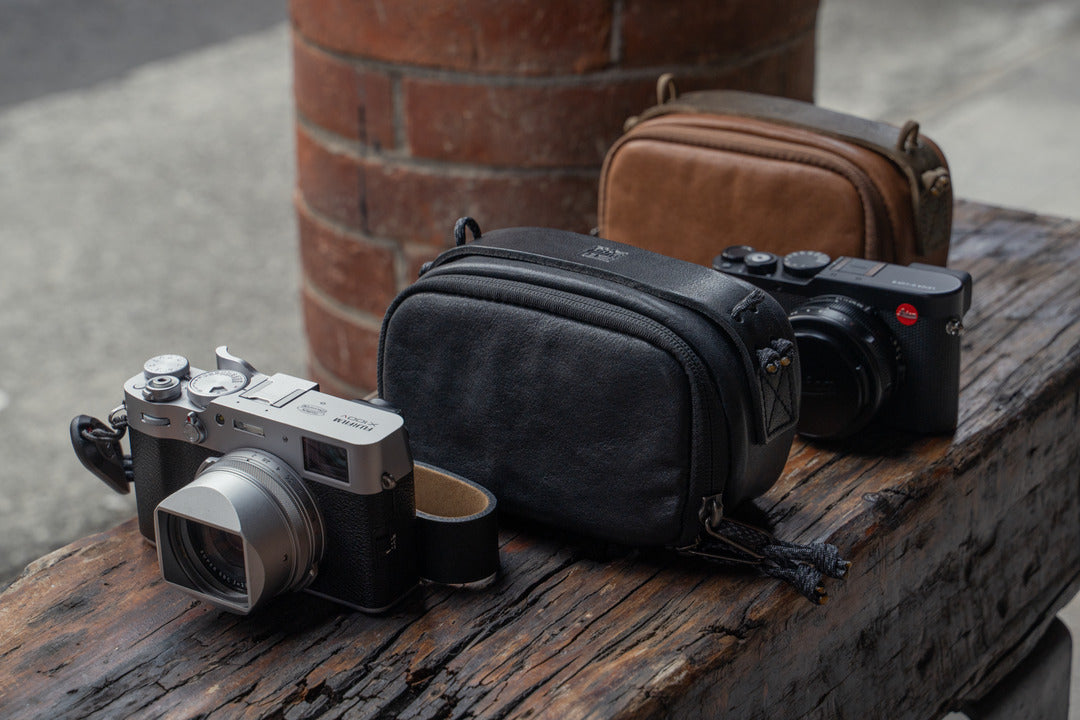 Wotancraft leather camera pouches in black and brown with Fujifilm and Leica cameras