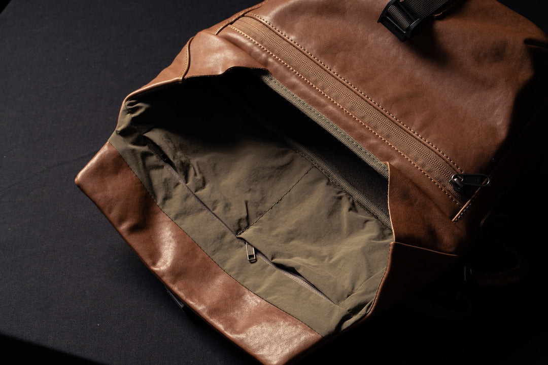 Wotancraft Pilot brown leather bag open, showing the olive lining and inner pockets