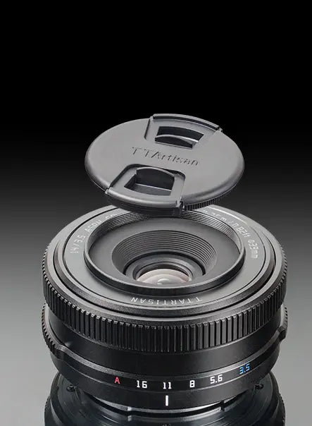 TTArtisan AF 14mm f/3.5 with its pinch lens cap