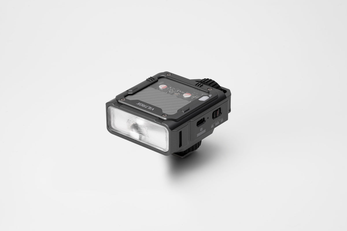 Viltrox Spark Z3 TTL flash, angled front view on grey