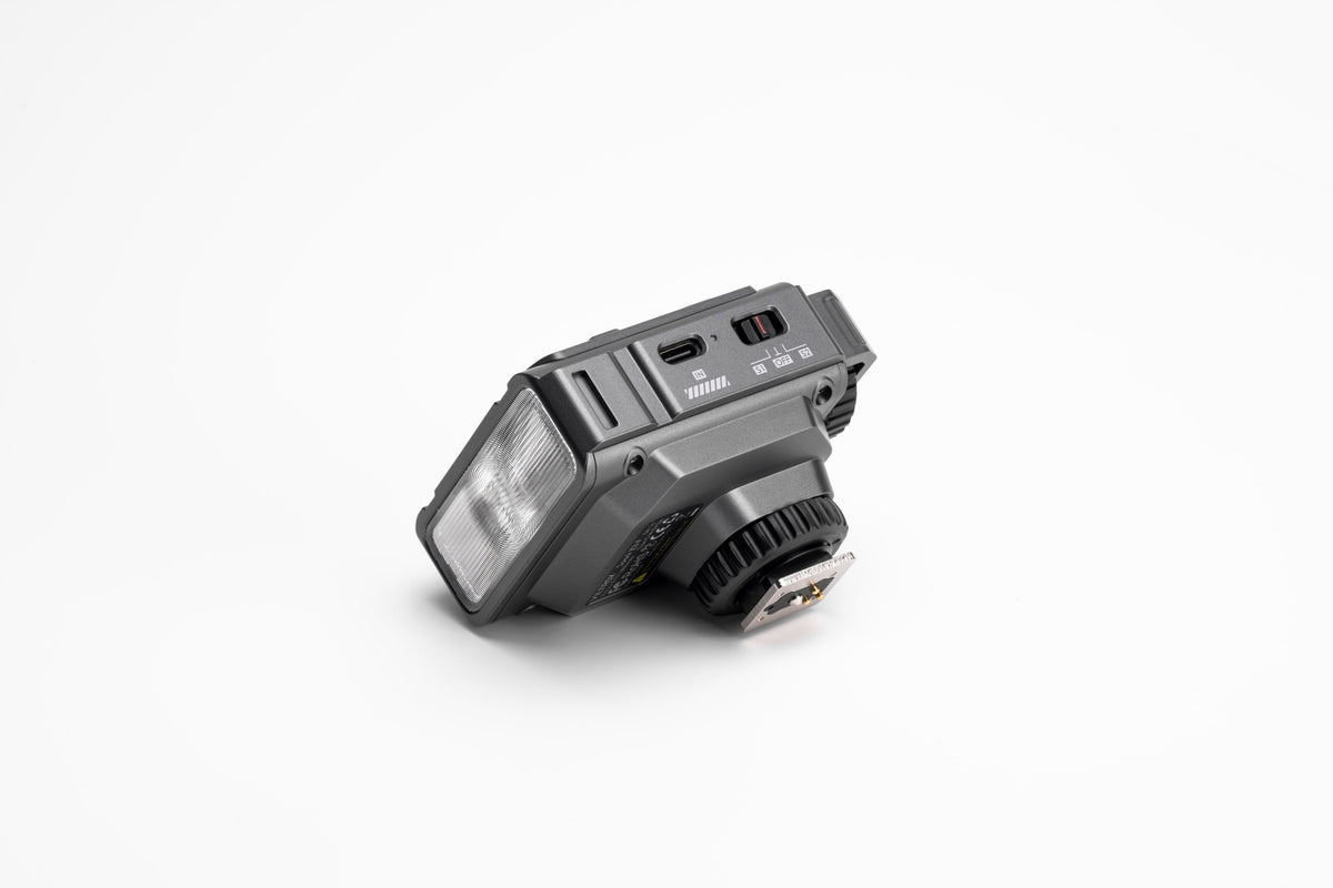 Viltrox Spark Z3 flash, side view with USB-C port and switches