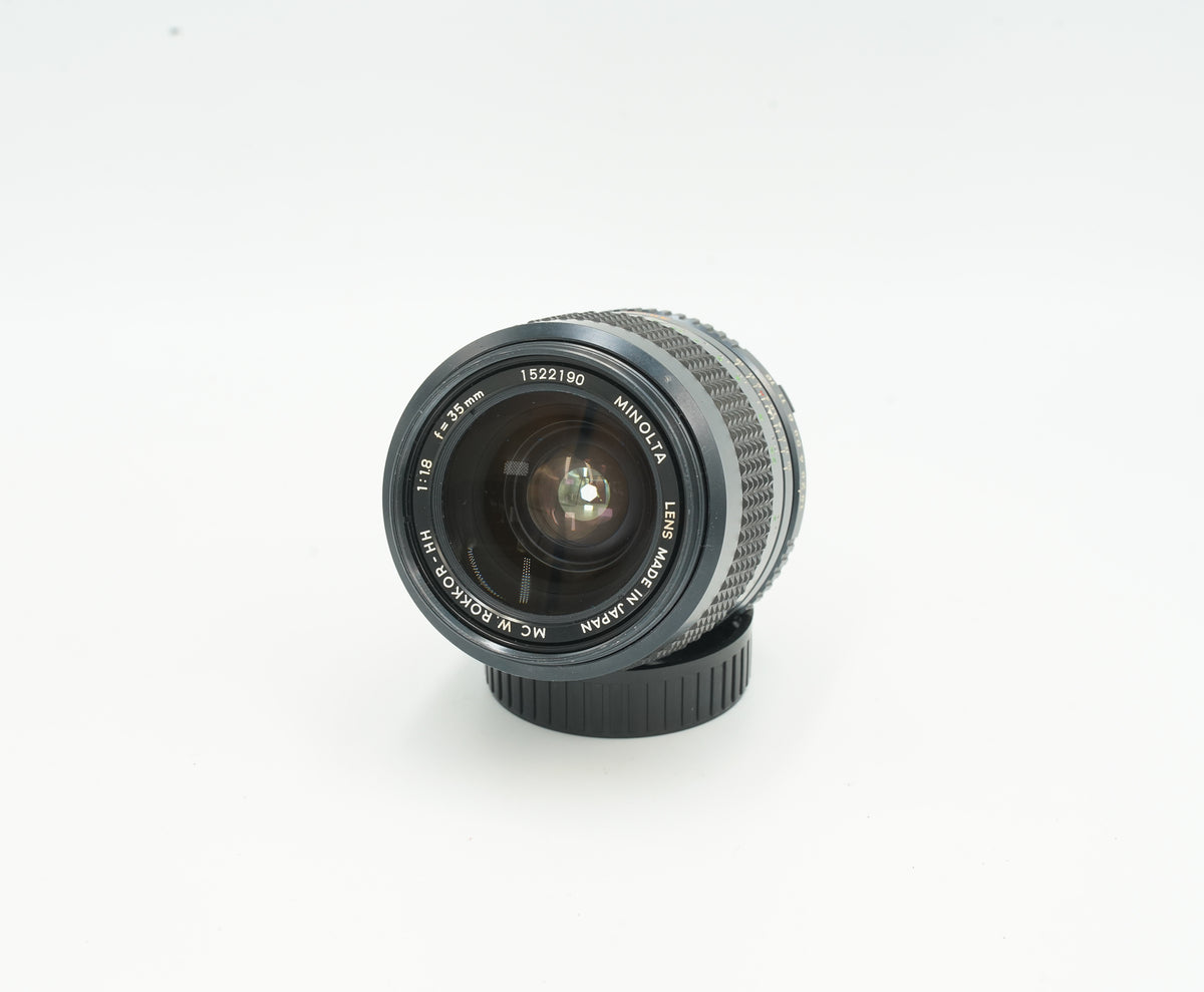 Minolta MC W.Rokkor-HH 35mm f/1.8 wide-angle lens, angled view