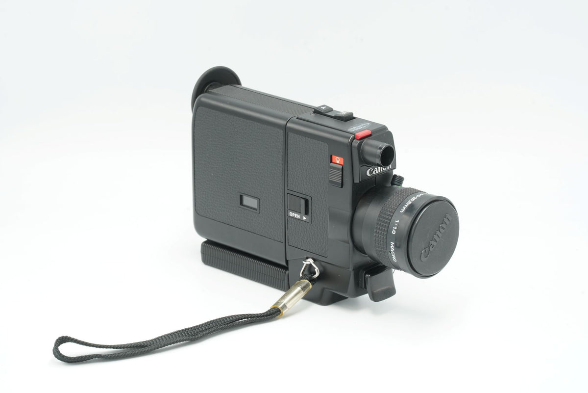 Canon 310XL vintage Super 8 film camera, rear three-quarter view with wrist strap