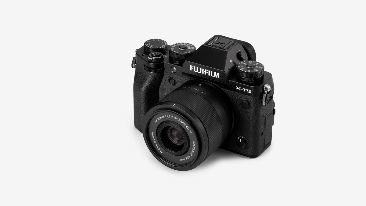 Viltrox Air AF 25mm f/1.7 XF mounted on a black Fujifilm X-T5, top view