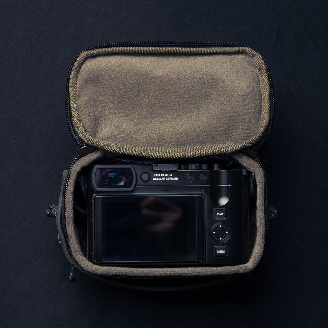 Wotancraft black canvas pouch open with a Leica Q inside, from above