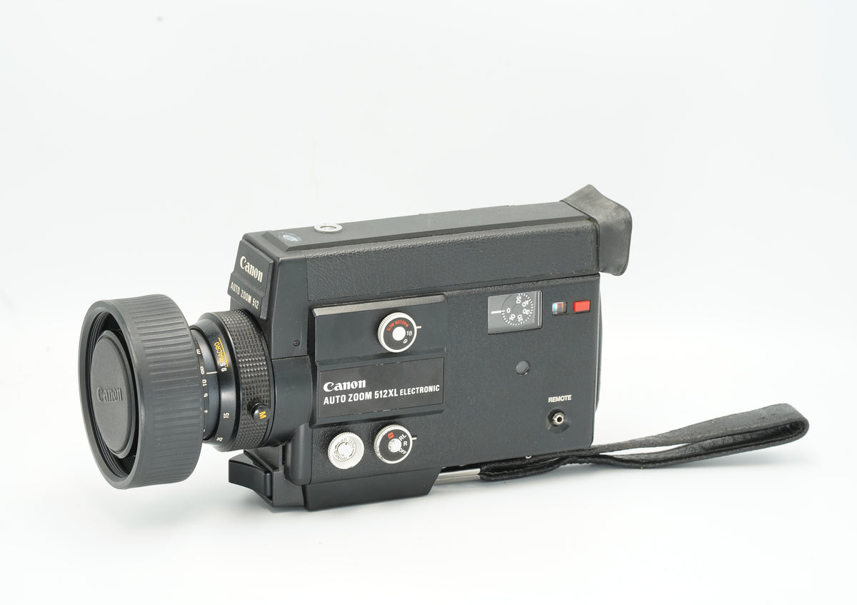 Canon Auto Zoom 512XL Electronic Super 8 movie camera with lens cap and wrist strap