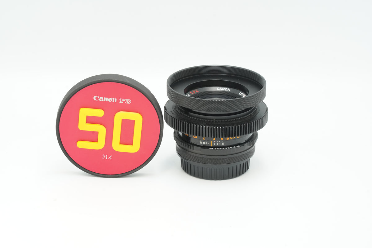Canon FD 50mm f/1.4 S.S.C. cine-modded to EF with focus gear and 50 front cap