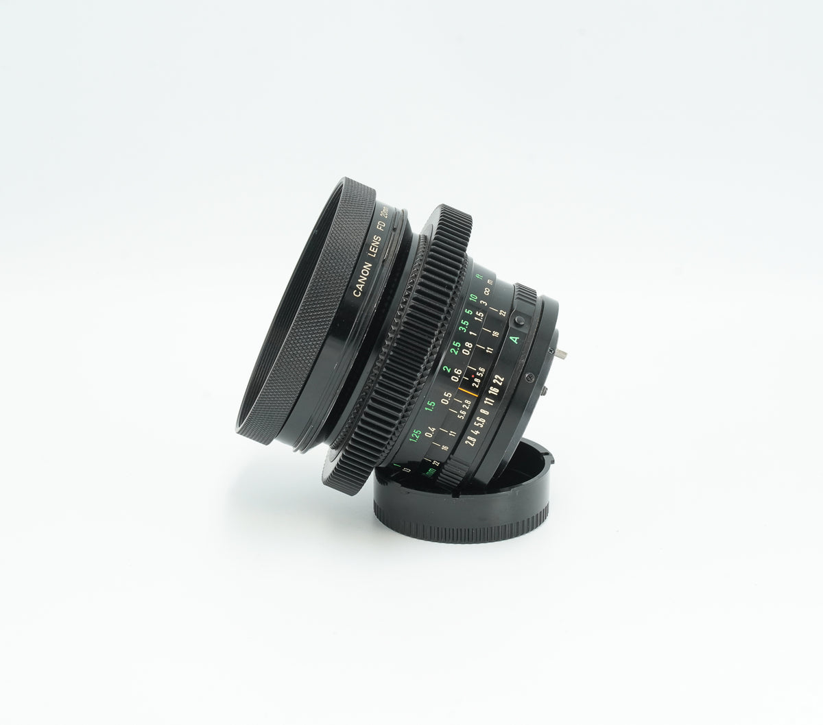 Canon nFD 20mm f/2.8 cine mod, side view with focus gear and FD scales