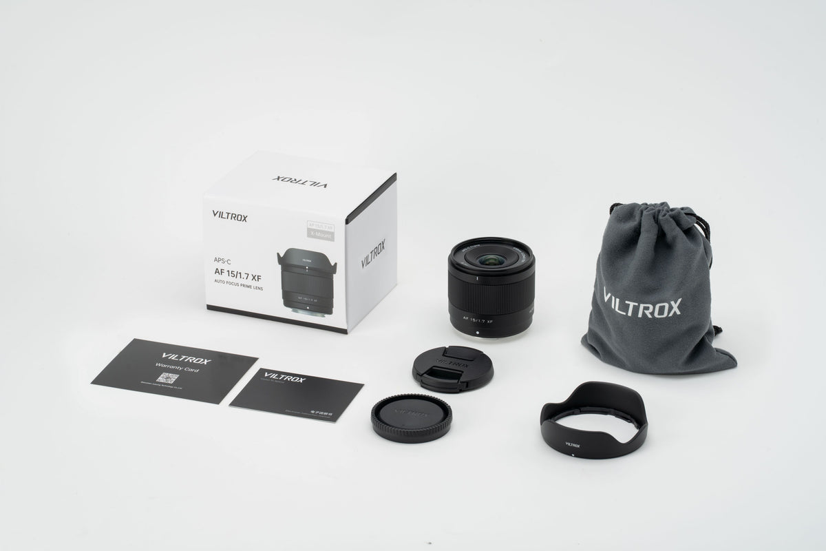 Viltrox Air AF 15mm f/1.7 XF box contents: lens, hood, pouch, caps and cards