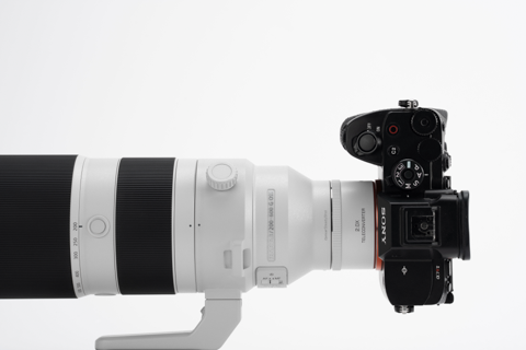 Viltrox 2.0x teleconverter between a Sony 200-600mm lens and Sony A7 body, side view