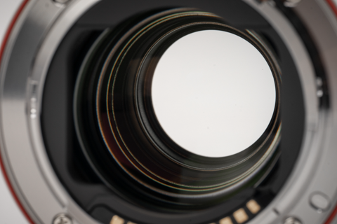 Viltrox 2.0x teleconverter optics close-up through the rear mount