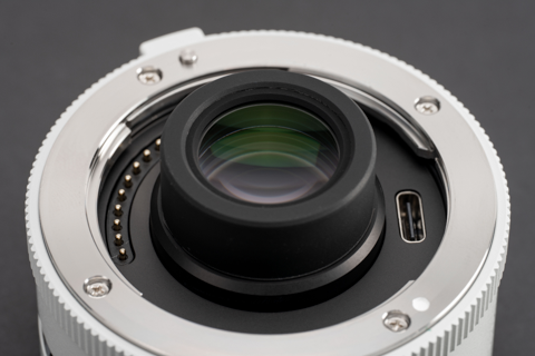 Viltrox 2.0x teleconverter close-up of the lens element, contacts and USB-C port