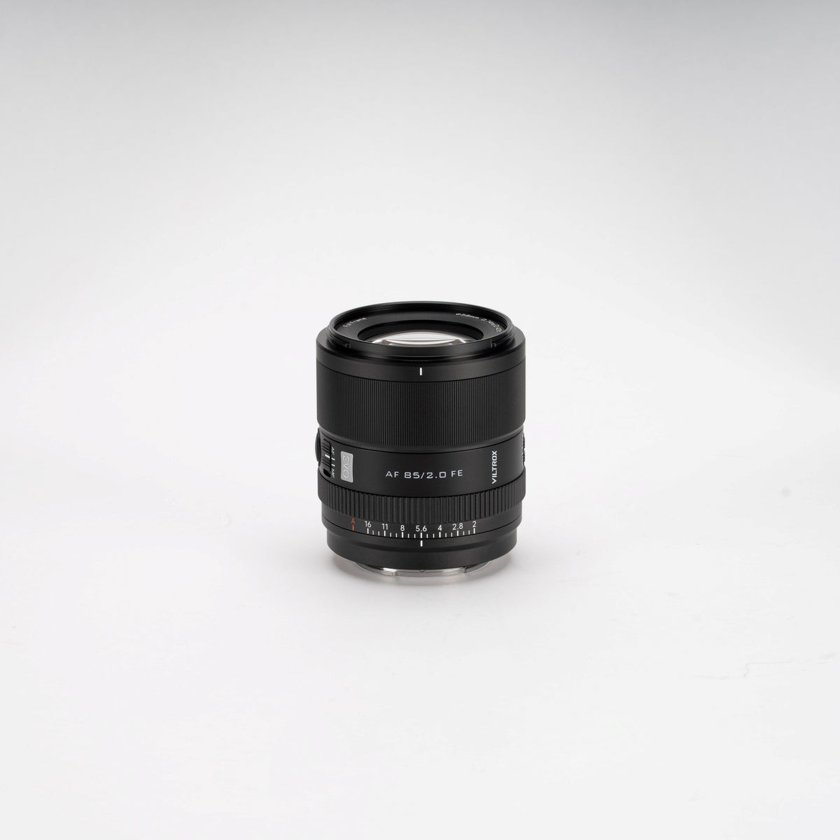Viltrox AF 85mm f/2.0 FE compact portrait lens on a light grey background