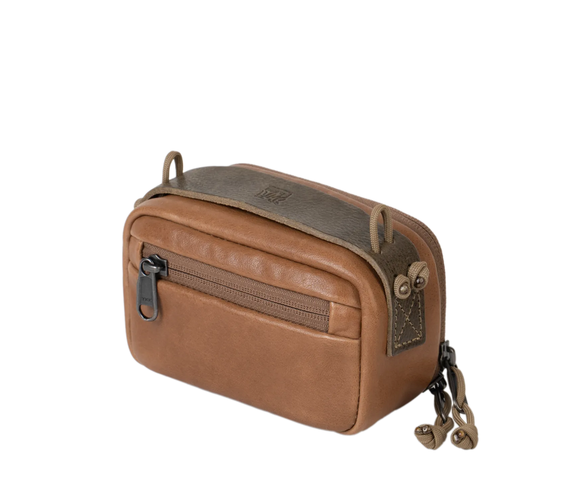 Wotancraft portable camera pouch in brown leather, medium size, angled view