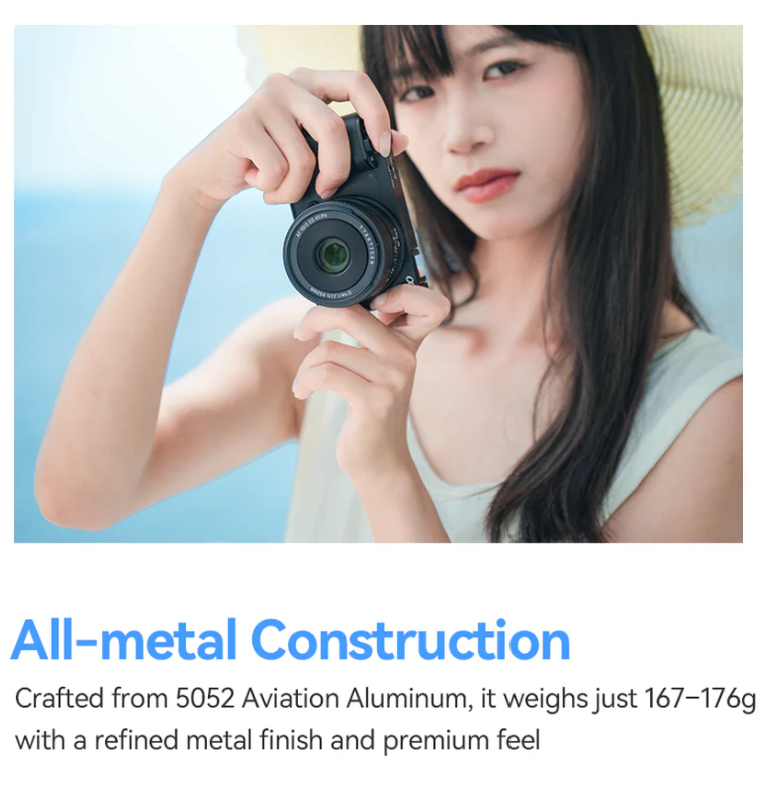 Woman with a camera fitted with the TTArtisan AF 40mm f/2, all-metal 167-176g lens