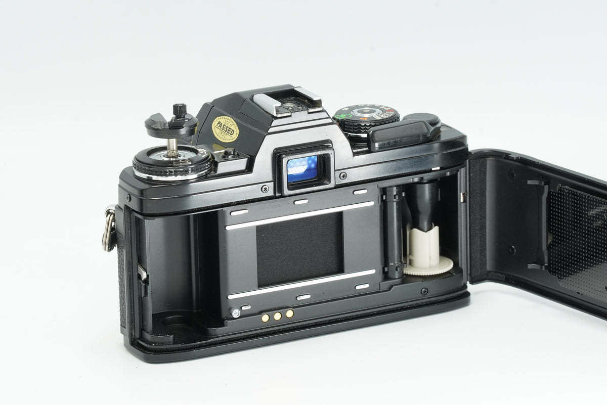 Minolta X-700 with the back open, showing the film chamber