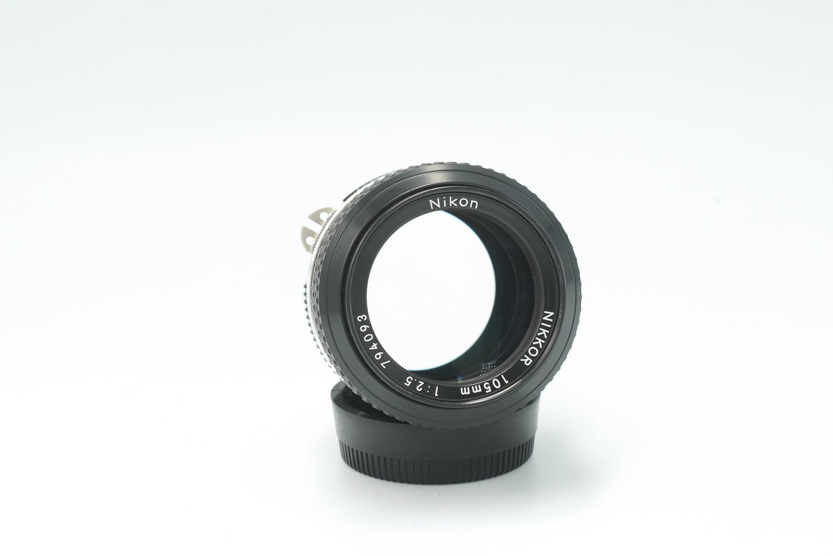 Nikon Nikkor 105mm f/2.5 lens, front view of the name ring