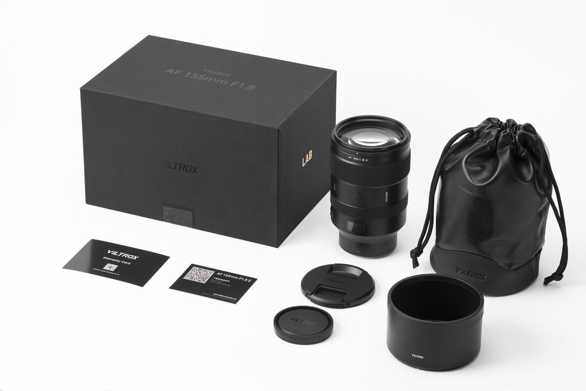 Viltrox LAB AF 135mm f/1.8 box contents: lens, hood, caps, pouch and cards