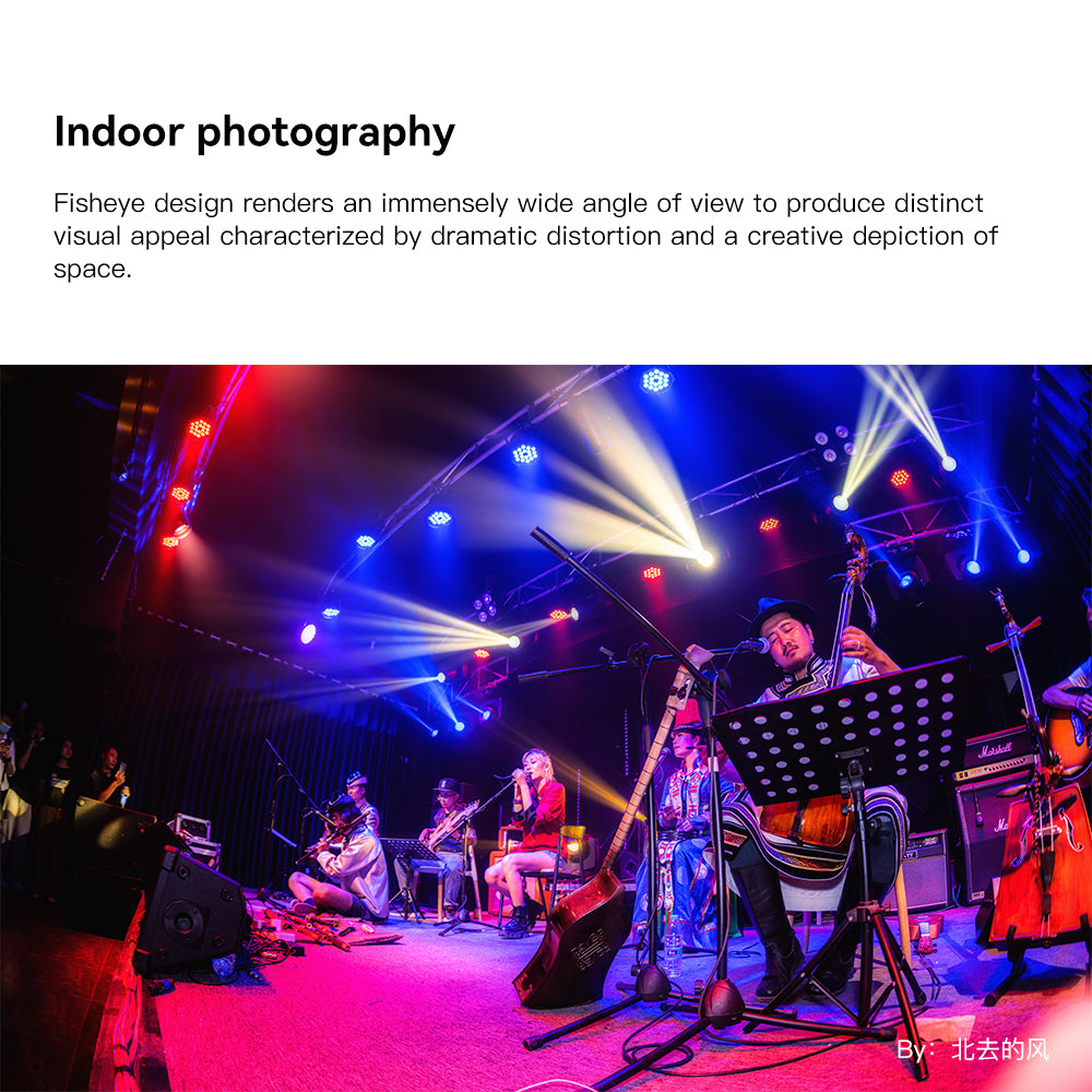 Band on a stage with coloured lights, indoor sample from the TTArtisan 11mm fisheye