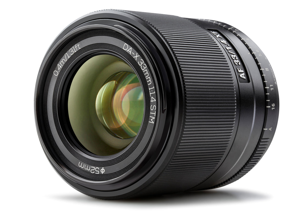 Viltrox AF 33mm f/1.4 XF APS-C autofocus lens for Fujifilm X-mount, angled view