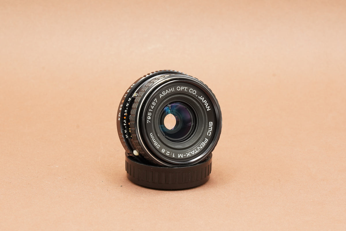 SMC Pentax-M 28mm f/2.8, front three-quarter view