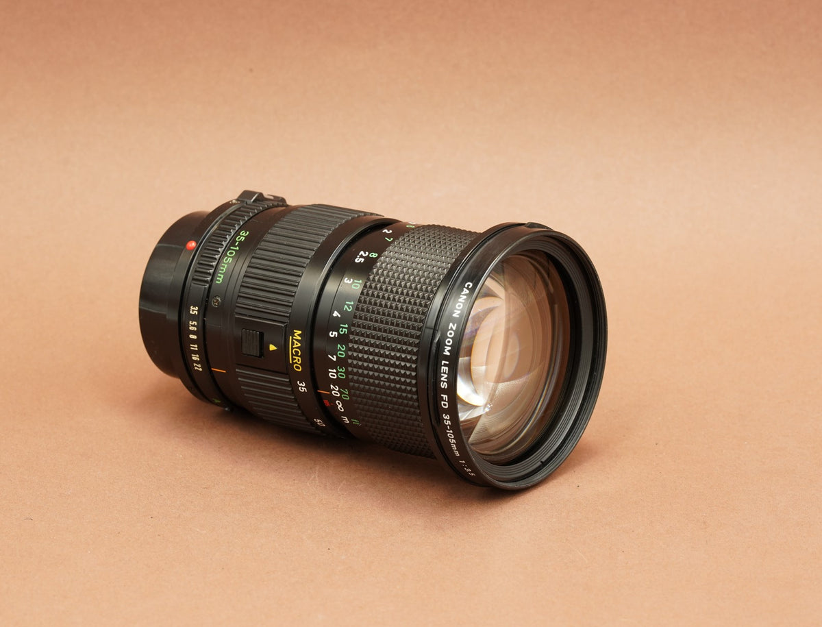 Canon New FD 35-105mm f/3.5 Macro zoom lens, angled view