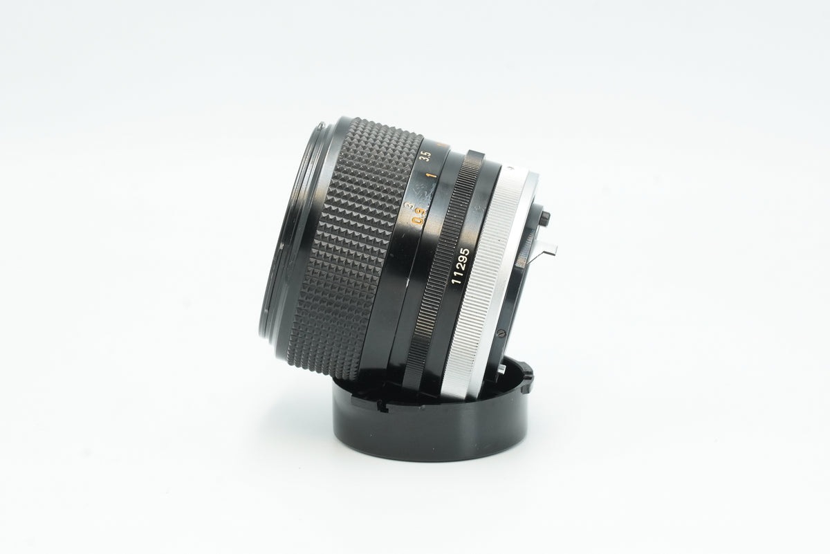 Canon FD 85mm f/1.8 S.S.C., side view with serial number