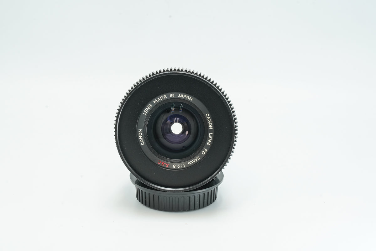 Canon FD 24mm f/2.8 cine-modded lens, front element and name ring