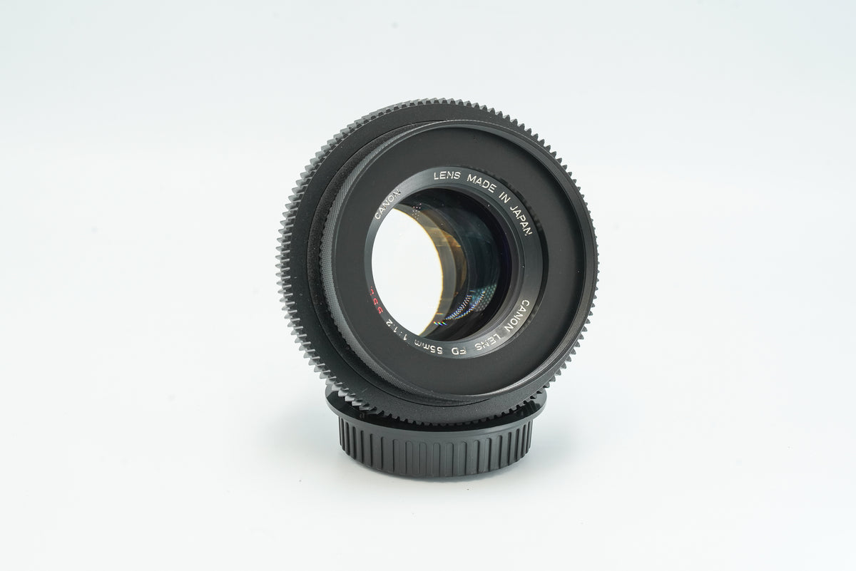 Canon FD 55mm f/1.2 S.S.C. cine mod, front view with focus gear