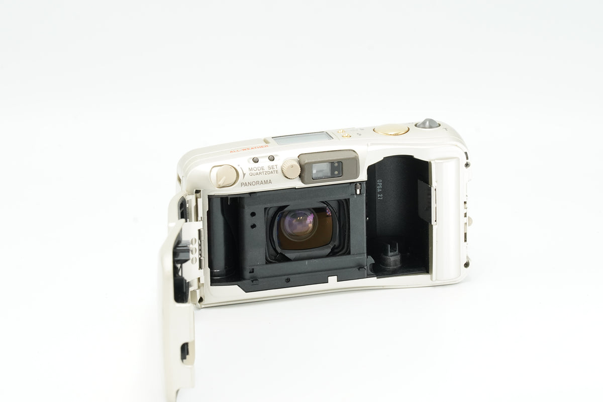 Olympus Mju Zoom 115 Deluxe with the back open, showing the film chamber