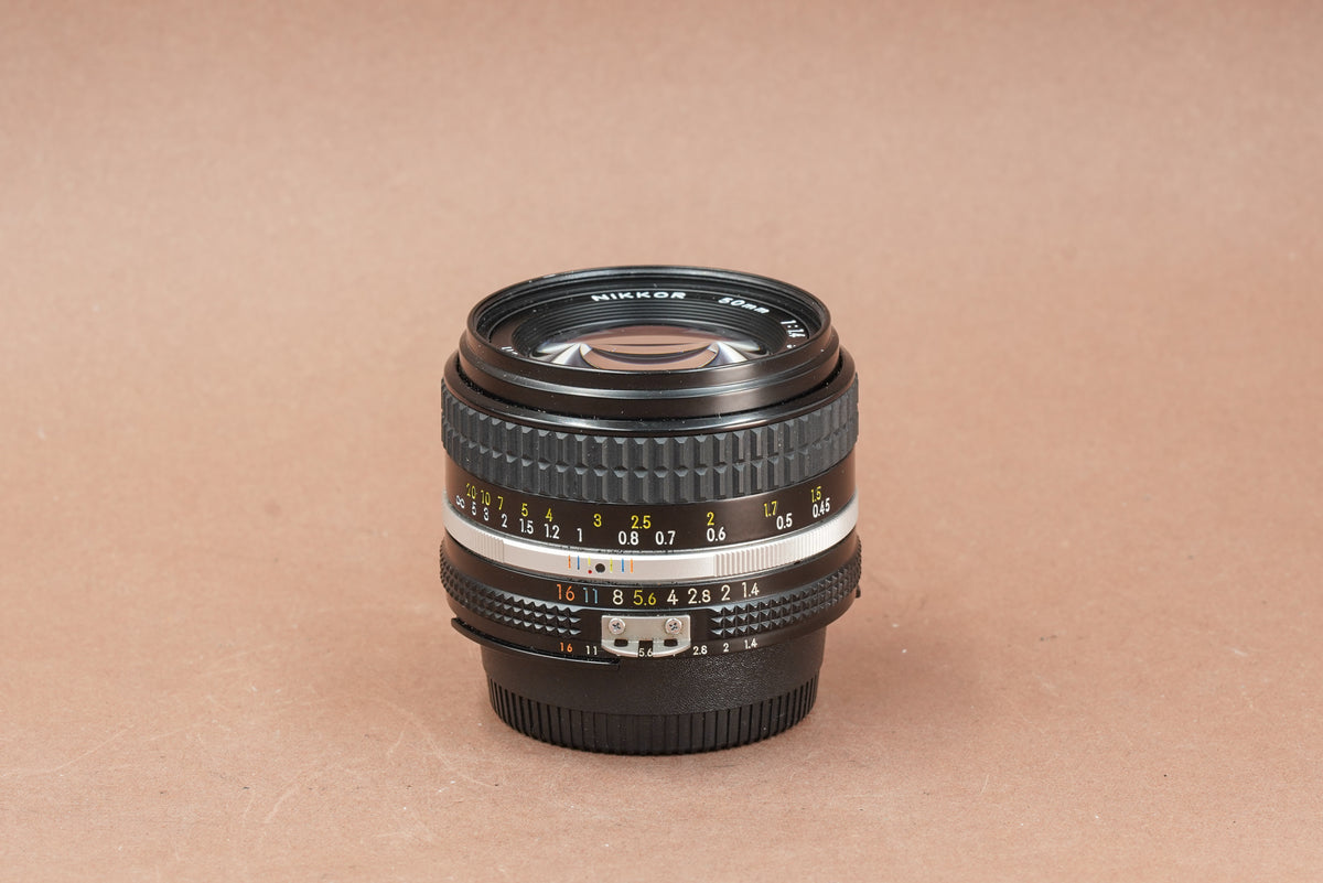 Nikon Nikkor 50mm f/1.4 Ai, side view with focus and aperture scales