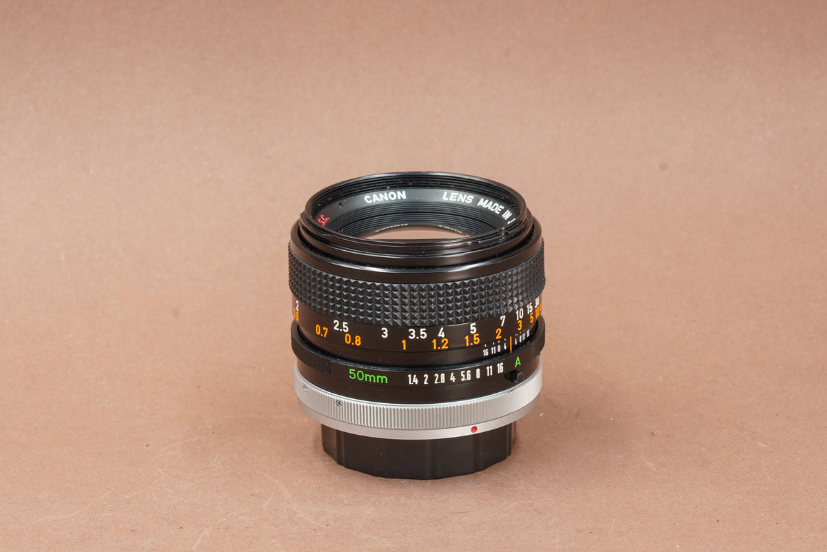Canon FD 50mm f/1.4 S.S.C., side view with focus and aperture scales