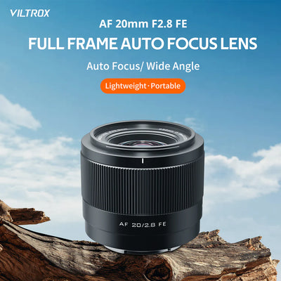 Viltrox AF 20mm f/2.8 FE lightweight full-frame autofocus lens on a log against blue sky