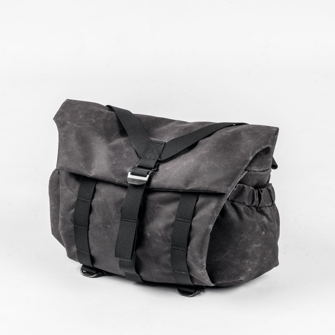 Wotancraft Pilot 7L messenger camera bag in charcoal black waxed canvas, front view