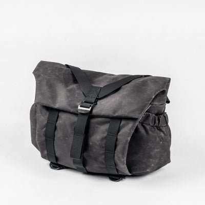 Wotancraft Pilot 7L messenger camera bag in charcoal black waxed canvas, front view