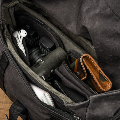 Wotancraft Pilot 7L charcoal bag inner compartment with camera, earphones and wallet