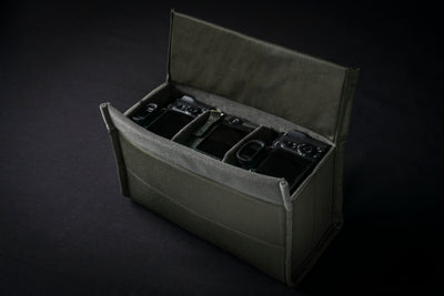 Wotancraft camera insert open with three camera bodies in compartments