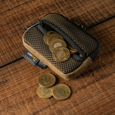 Wotancraft mesh coin pouch open with coins spilling out