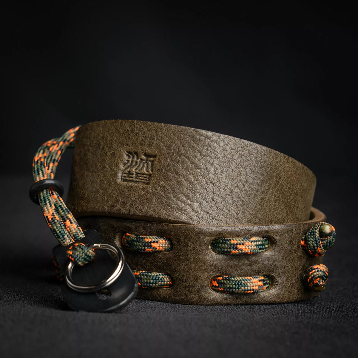Wotancraft Parashooter Style 8 olive leather camera strap with camo paracord, coiled