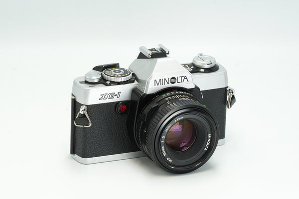 Minolta XG1, silver, with 50mm portrait lens