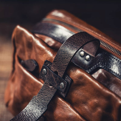 Wotancraft Mini Rider brown leather strap and rivets close-up