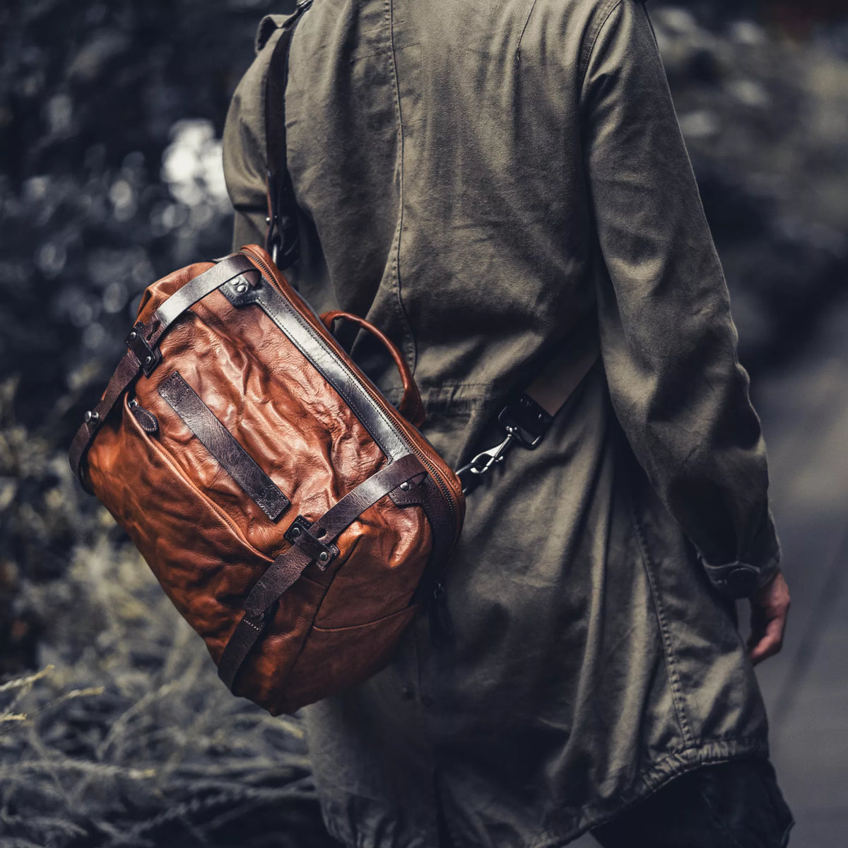 Man wearing the Wotancraft Lightning Rider brown leather bag across the back