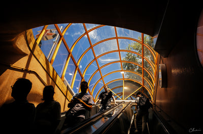 Escalator under a glass dome on a sunny day, sample photo from the Thypoch Eureka 28mm f/2.8